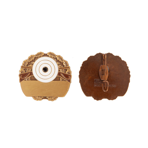 Schießscheibe mit braunen Gewehren