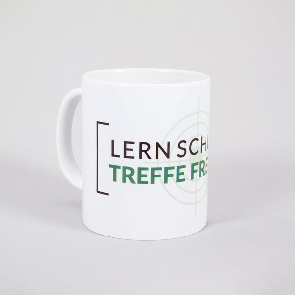 Tasse Carina "Lern schießen treffe Freunde"