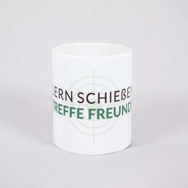 Tasse Carina "Lern schießen treffe Freunde"